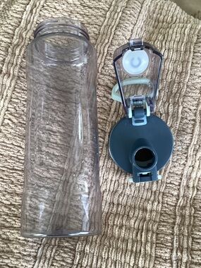 Clear Plastic Water Bottle with Dark Teal Flip Lid